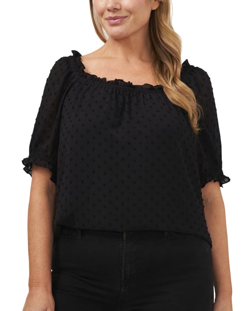 Front of a model wearing a size 1X Omni Dotted Frilly Weekend Top in 060-RICH BLACK by CeCe. | dia_product_style_image_id:263587